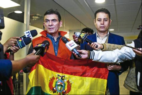 Rodrigo Paz y Edman Lara